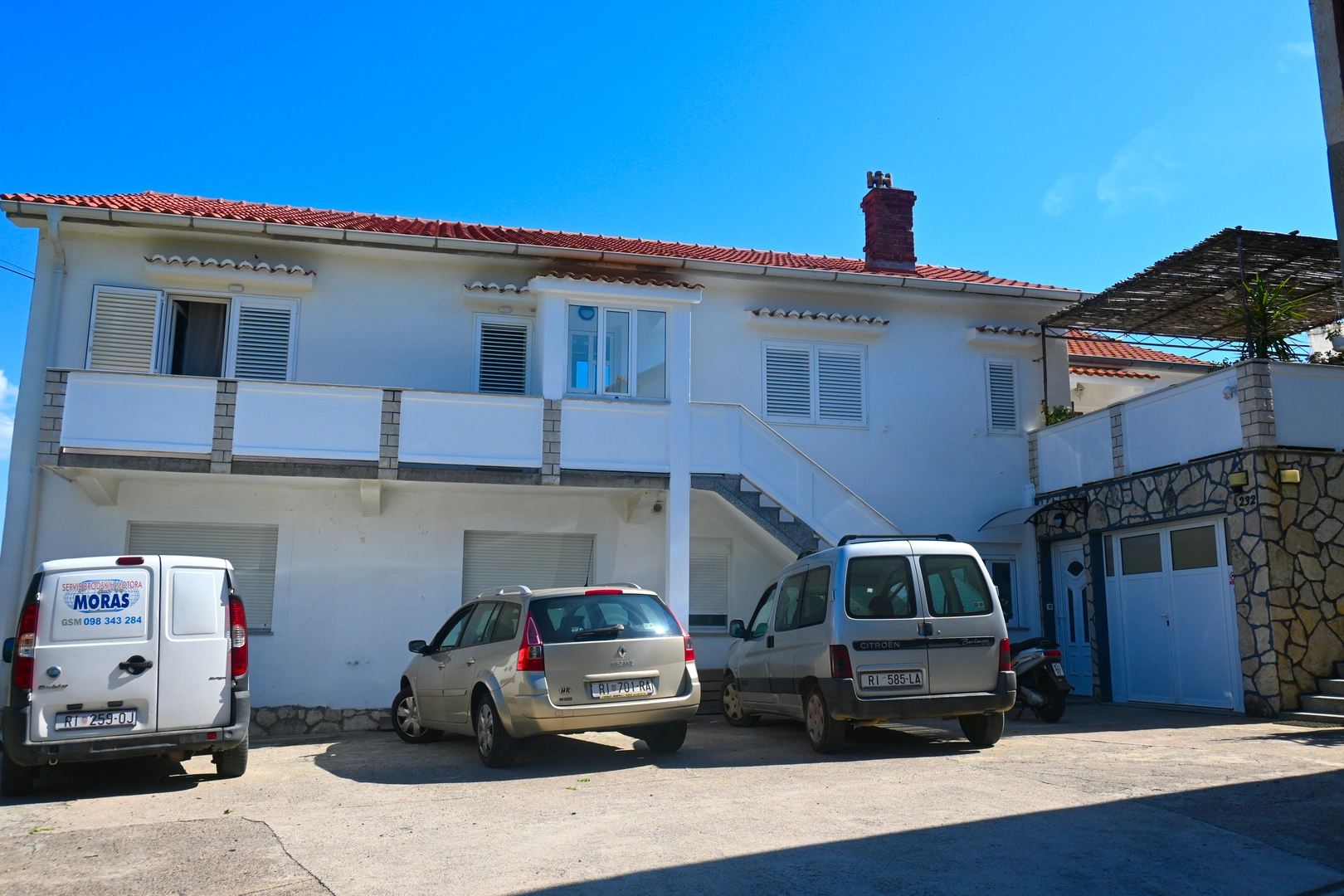 House from the outside and Parking spot